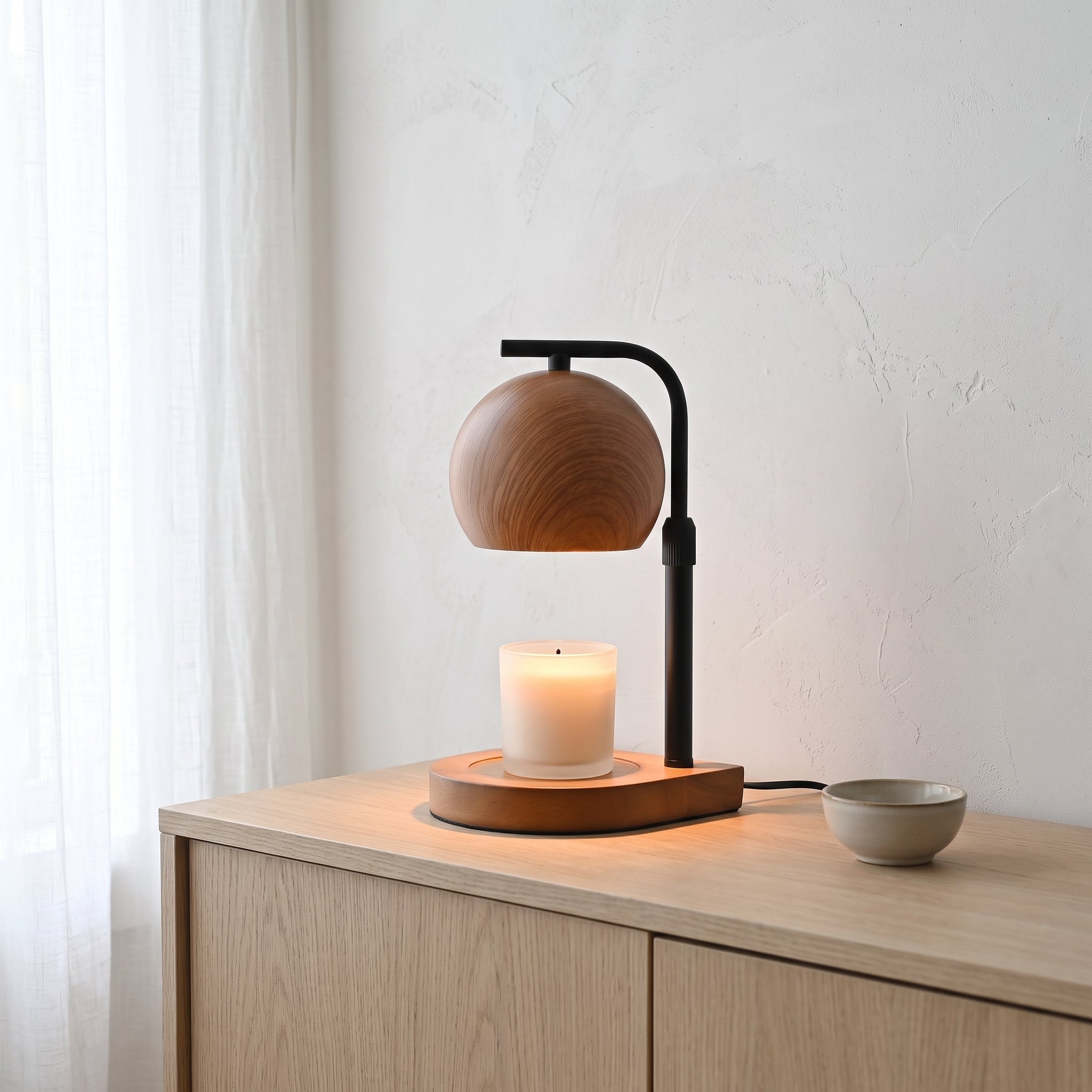 Brink candle warmer on a pale oak sideboard