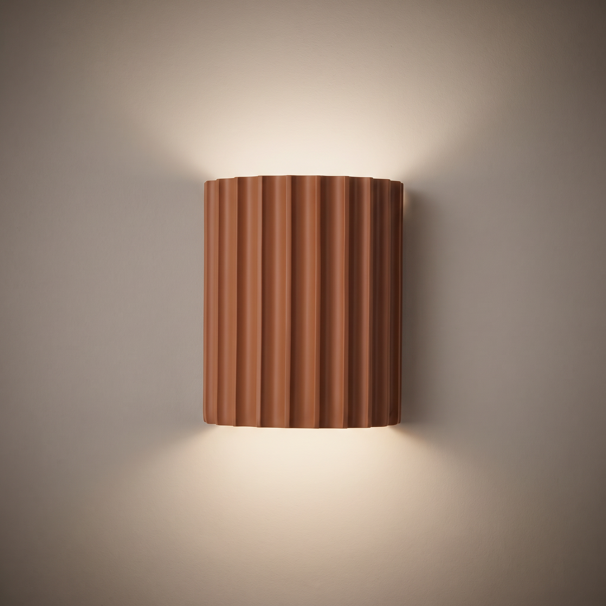 glen wall light in brown, fluted resin, studio hero