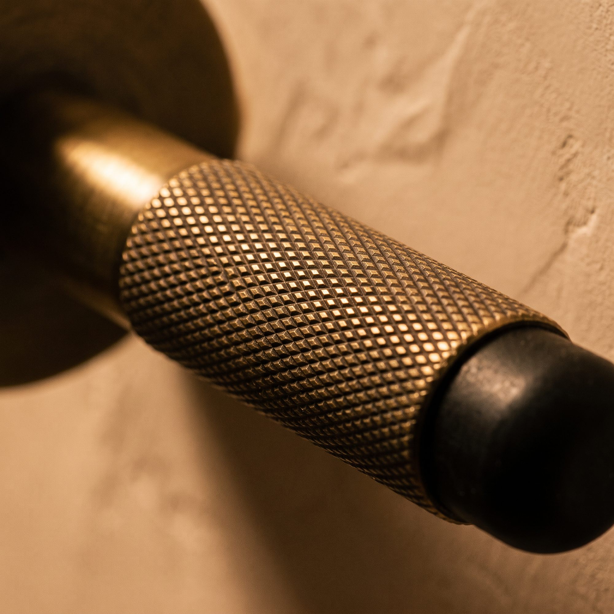 fell door stop knurled brass texture detail