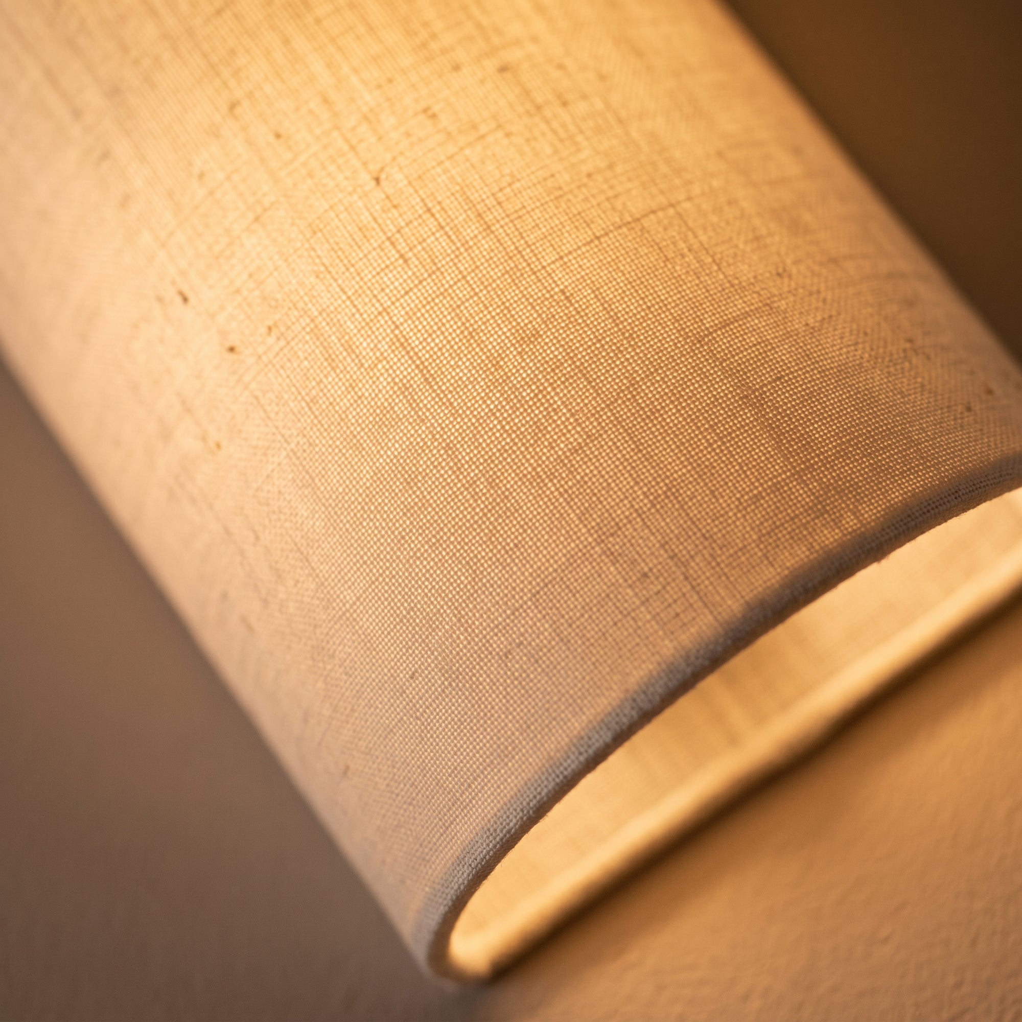 flue wall light, linen texture detail