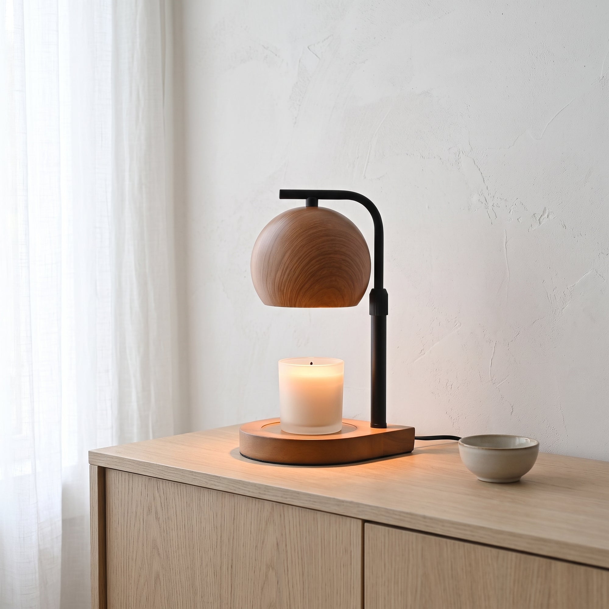 Brink candle warmer on a pale oak sideboard