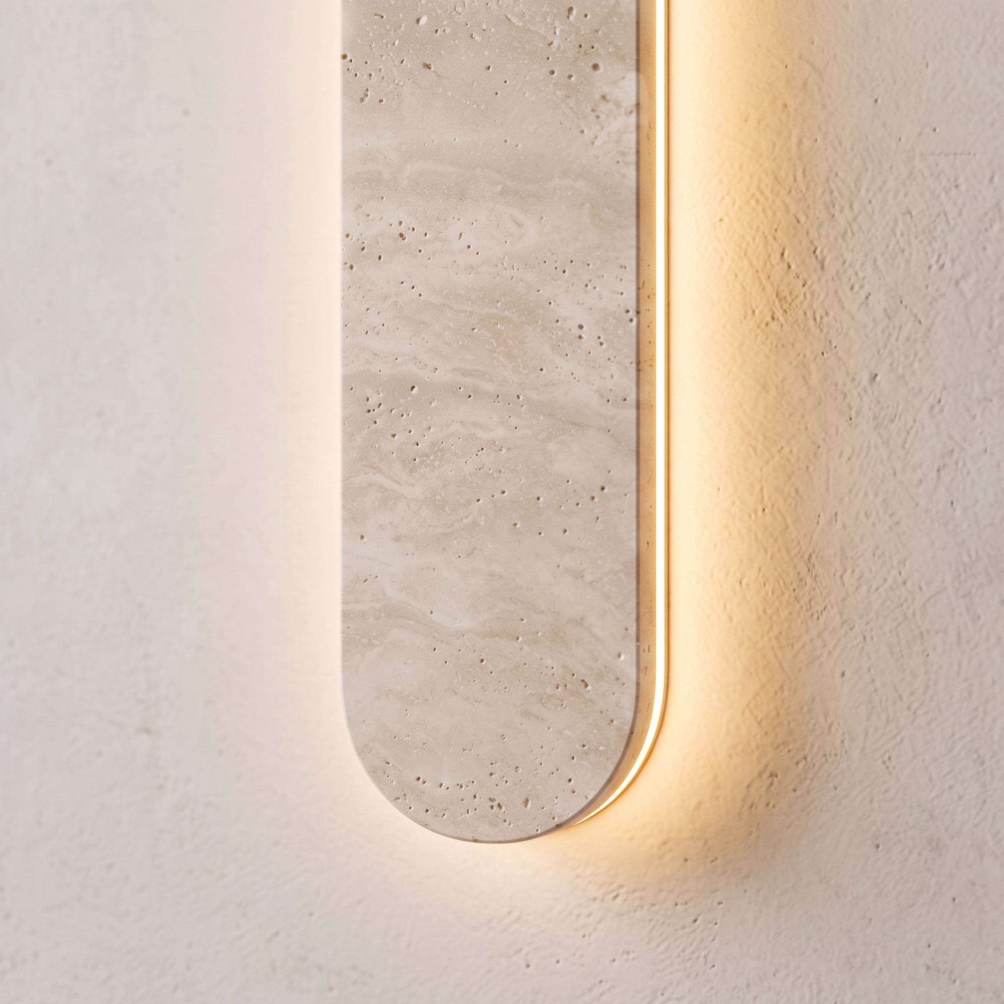 mori wall light macro detail of stone-effect texture and LED edge glow