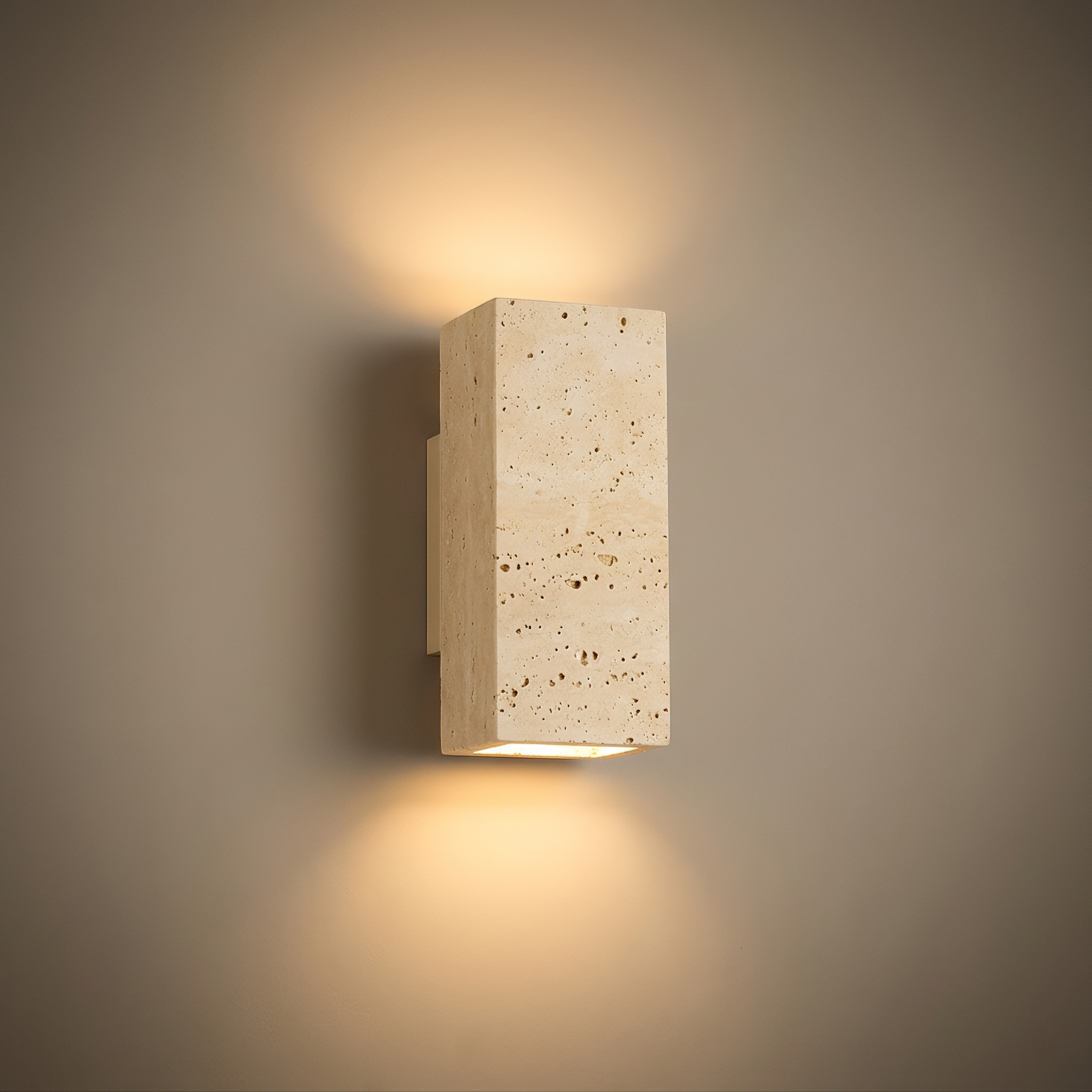 scar wall light, studio hero, honed travertine block wall light with warm up and down glow