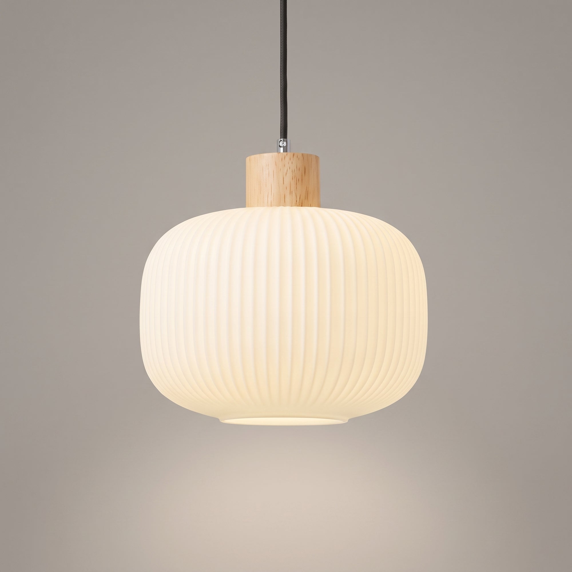 wold pendant light, Drum profile, ribbed milk-white glass with pale oak collar, studio hero