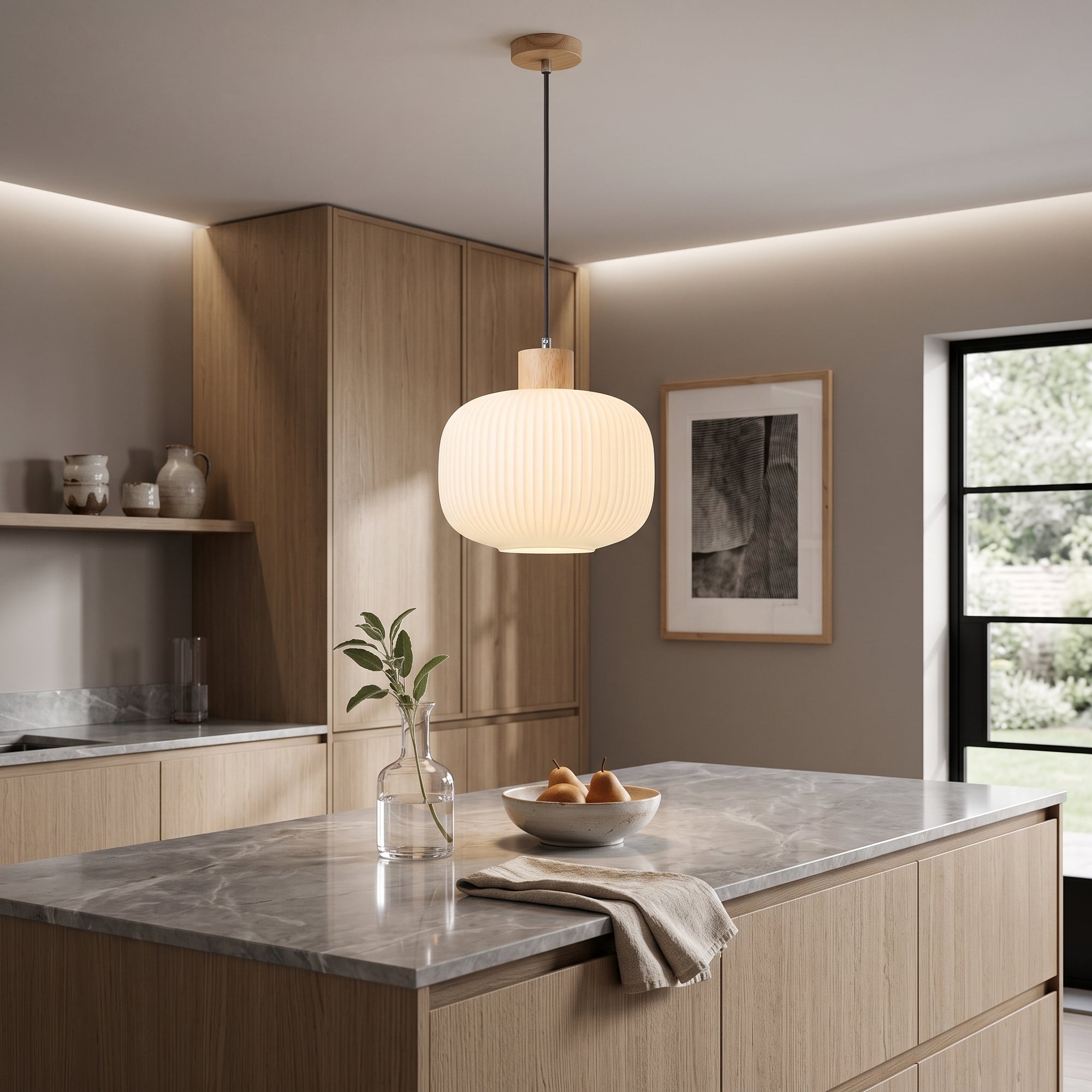 wold pendant light, Drum profile, hung over a pale oak kitchen island